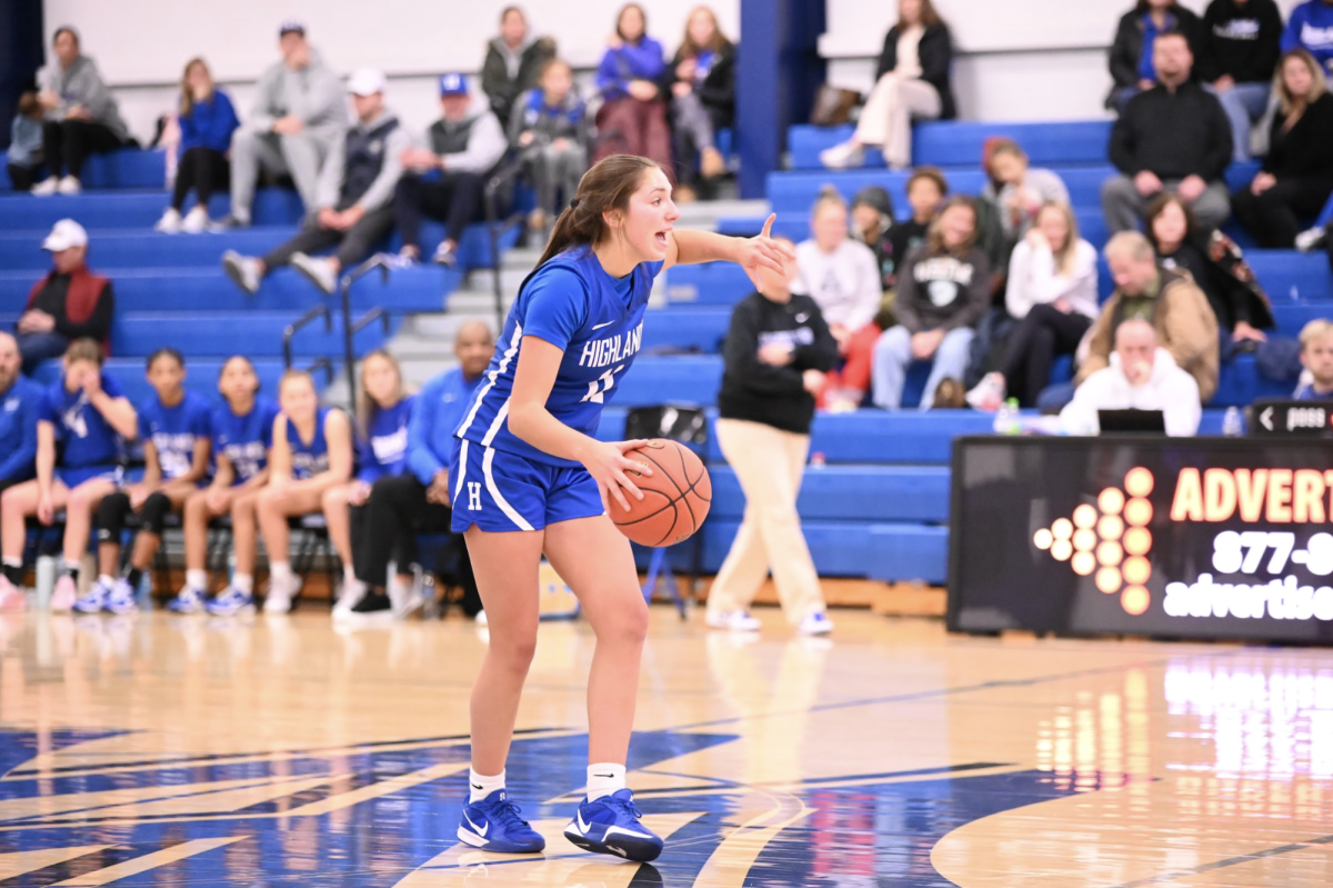 Gabby Neufarth (10) holds the ball up looking to pass to another teammate. “ During the game I was thinking that I just need to remain making the right plays and decisions to get the win,” Neufarth said.