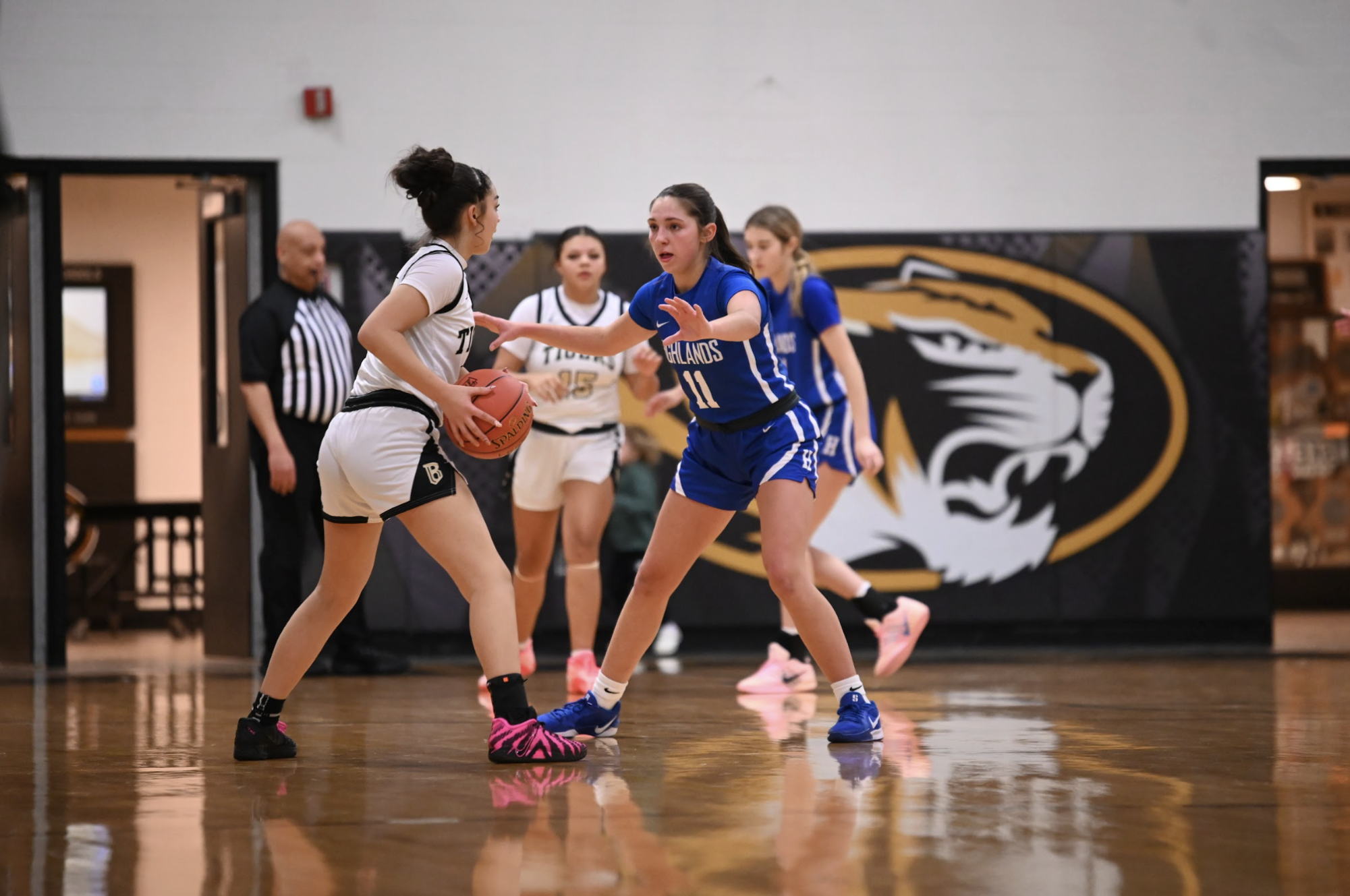 Gabby Neufarth (10) plays on-ball defense.