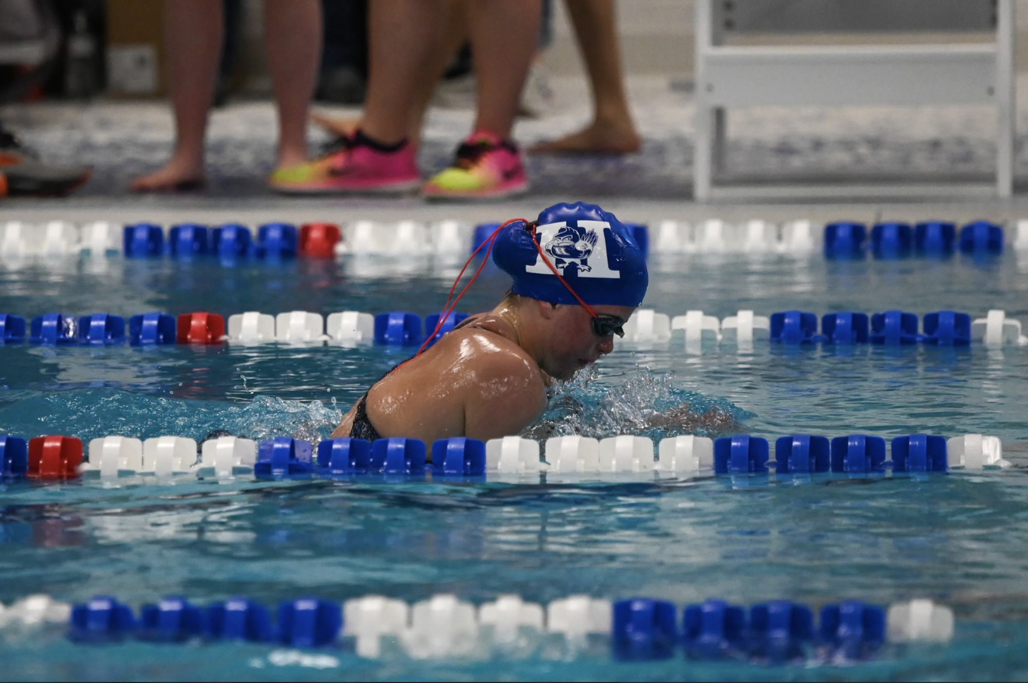 Audrey Sorrentino (12) glides through the water during her 100 yard breaststroke. "I loved this meet and cheering on my teammates for their races," Sorrentino said.
