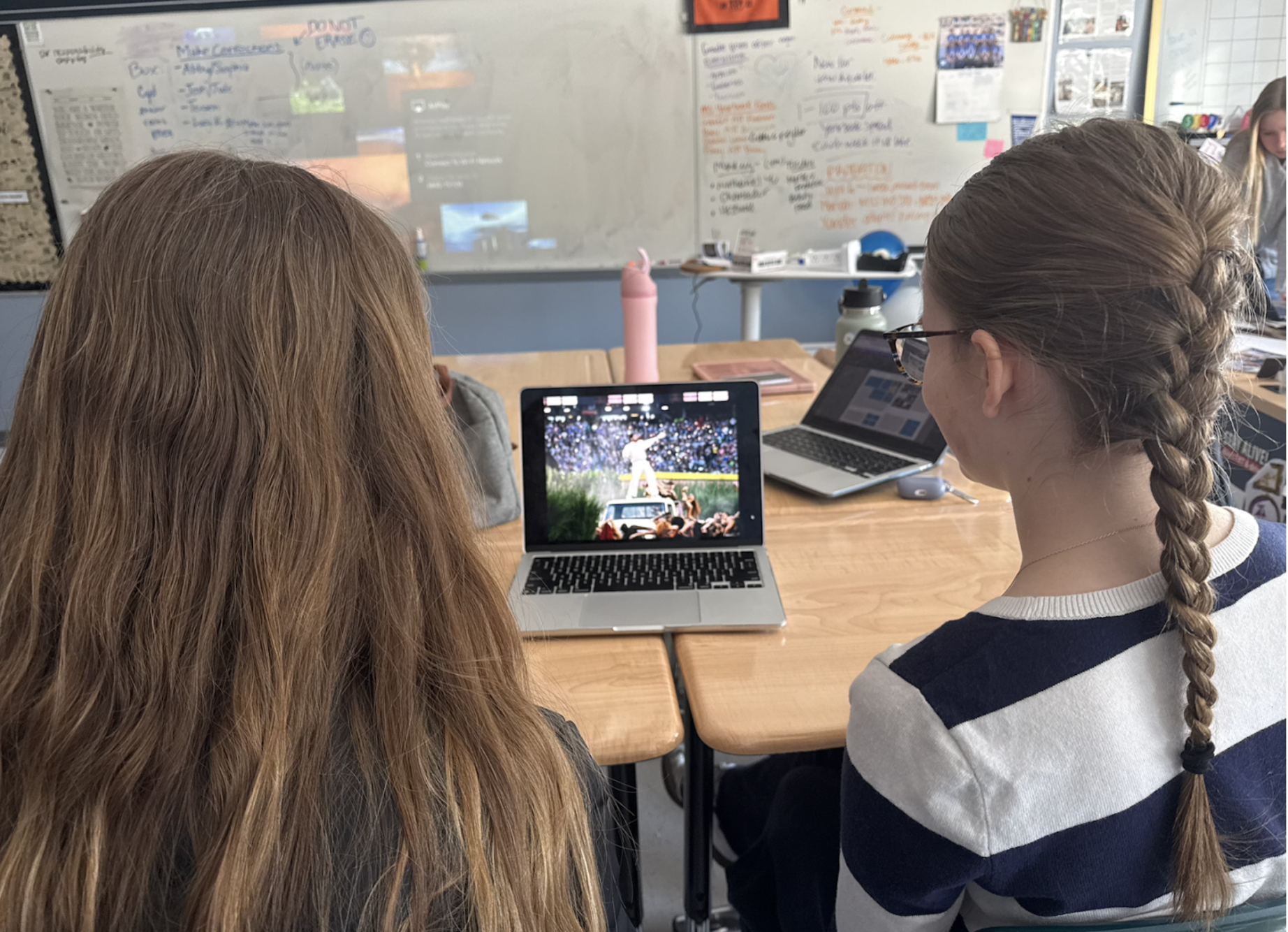 Natalie Abdon (10) and Stella Taylor (10) watch Bad Bunny’s Super Bowl Halftime Show.