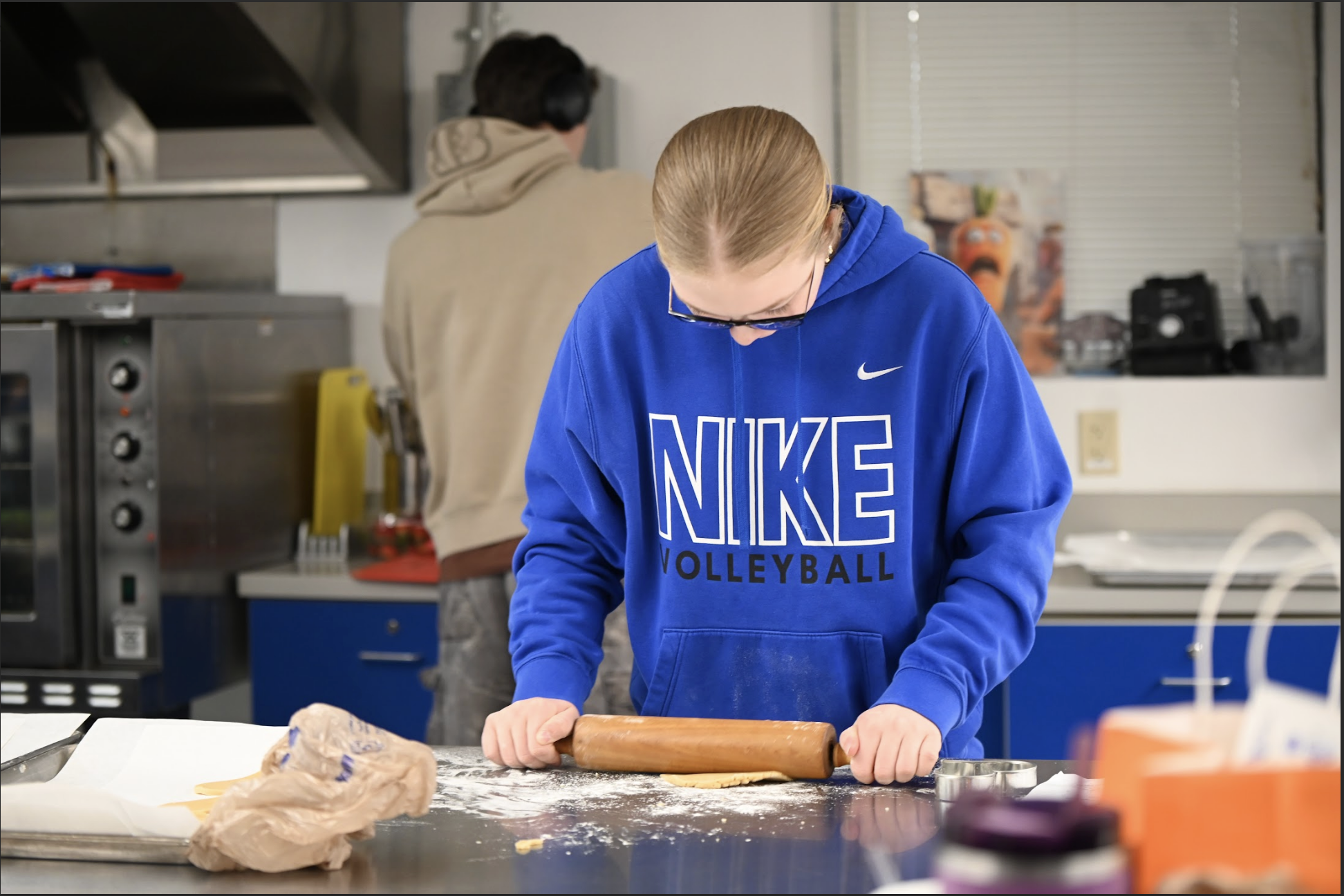 Bella Thomas (10) rolls out cookie dough. "I was rolling out cookie dough for cut out cookies," Thomas said.