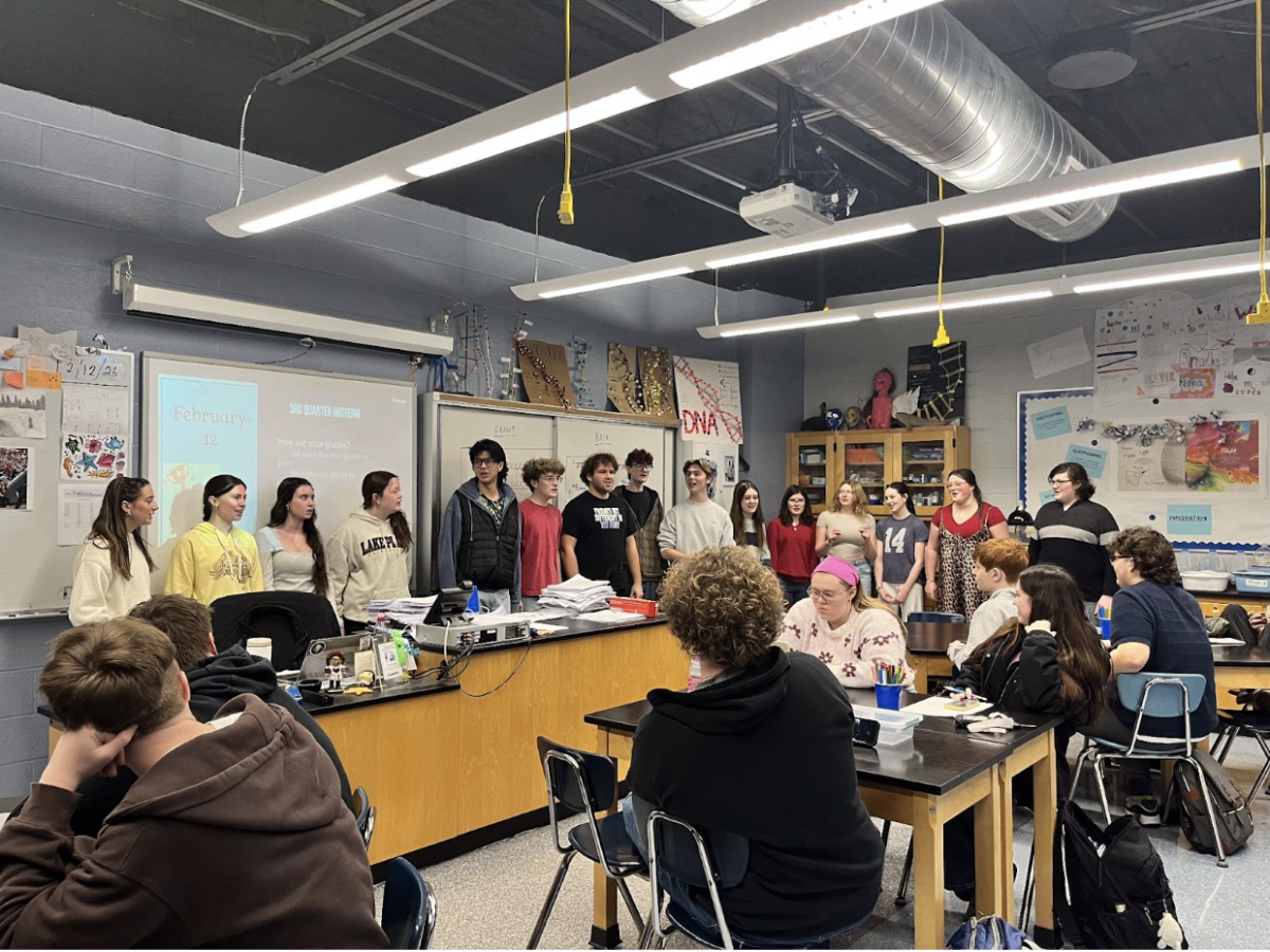 Acapella group sings to Matthew Ewald's advisory (Courtesy of James Wilson (12)).