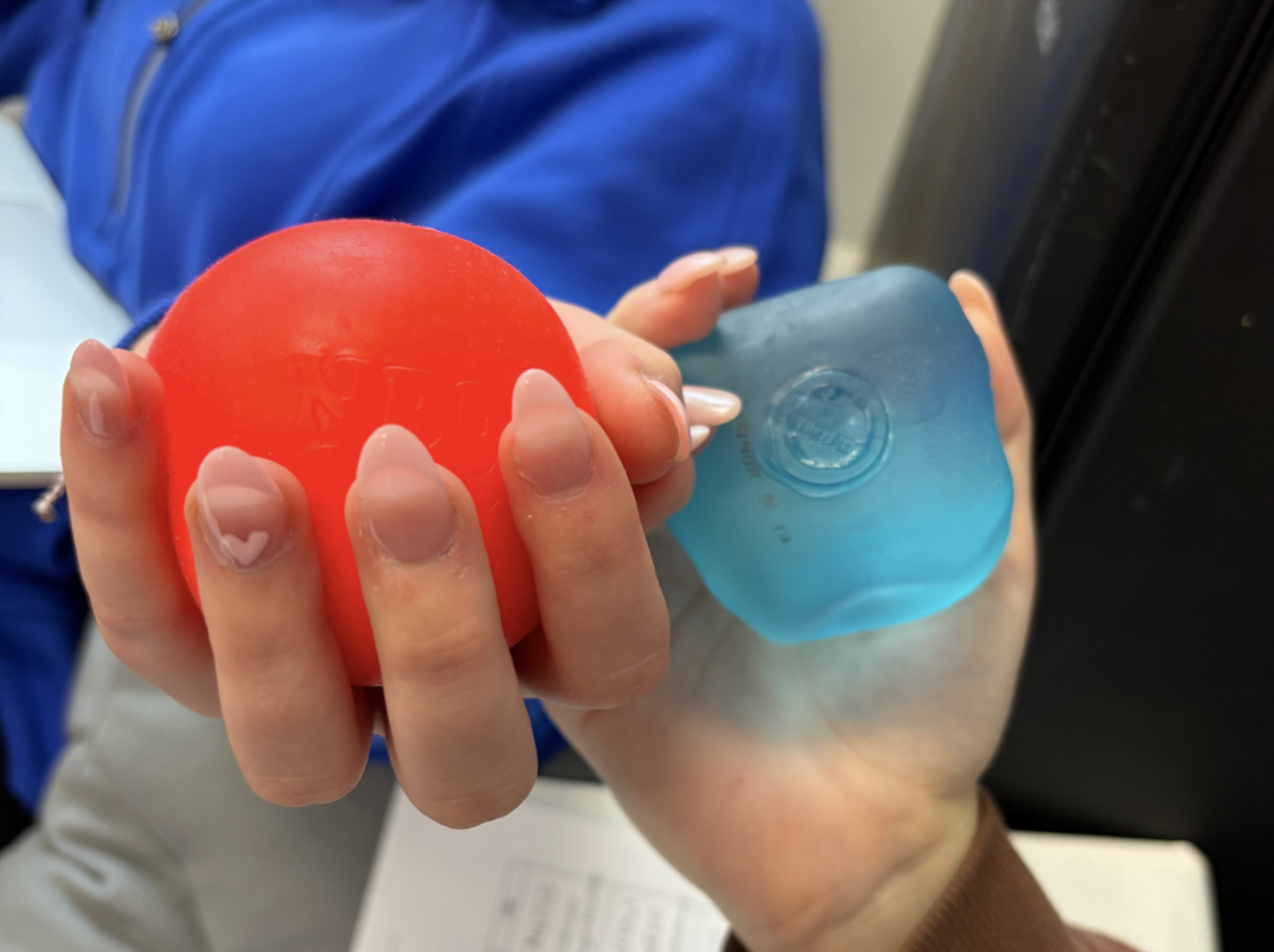 Natalie Hinegardener (12)  plays with squishy toys during class.