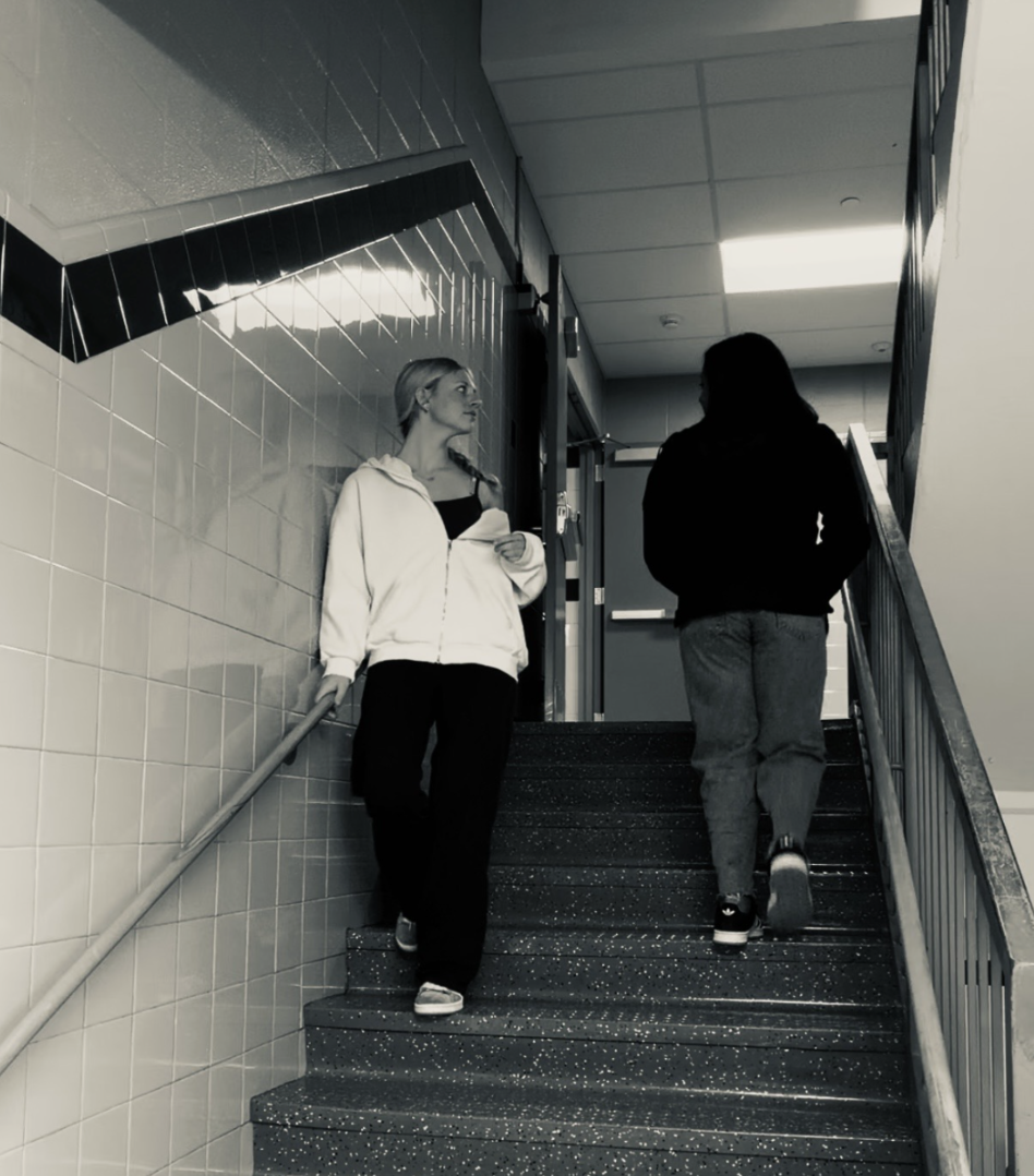 Mackenzie (9) walks past an old friend Mariah Ofori-Attah (9).