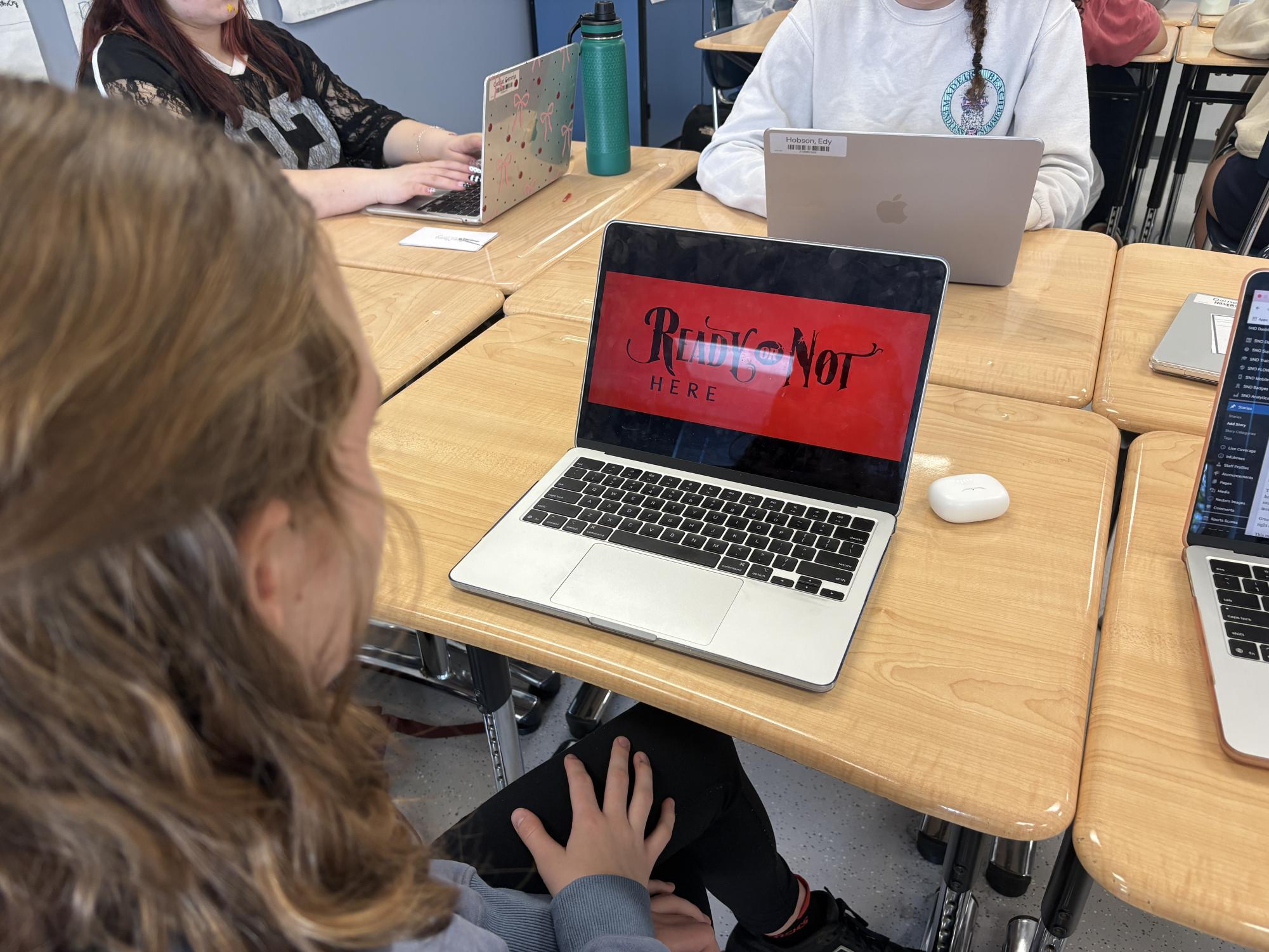Sophie Taylor (11) watches "Ready or Not 2: Here I Come."
