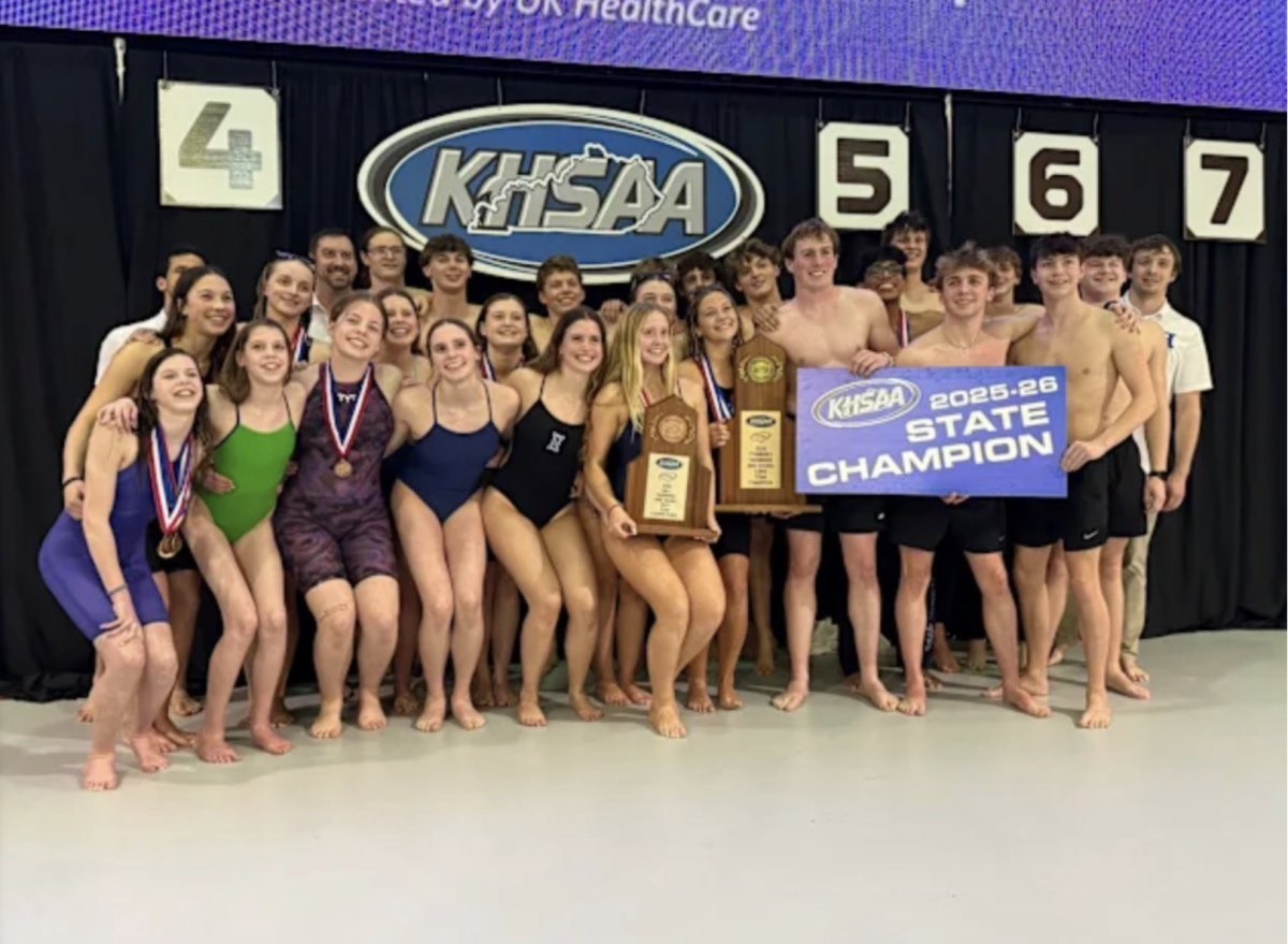The Highlands Swim and Dive team pose with their State Titles (Courtesy of Ella Kate Reynolds).