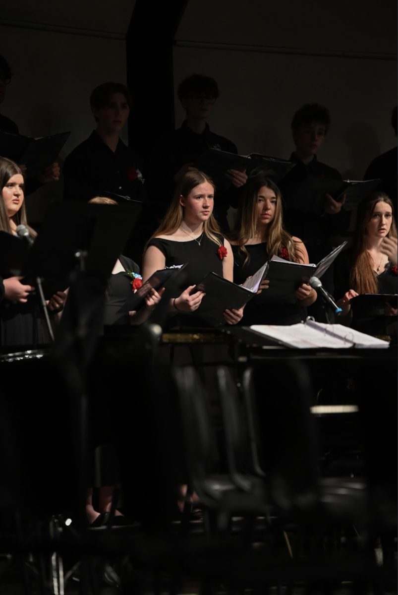 Caroline Eagan (11) looks emotionally to the audience.