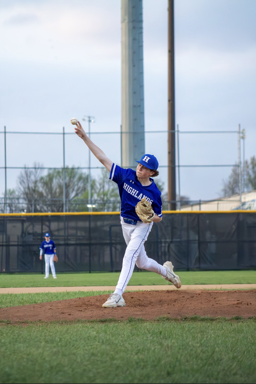 Ethan Forbes (9) throws a pitch.