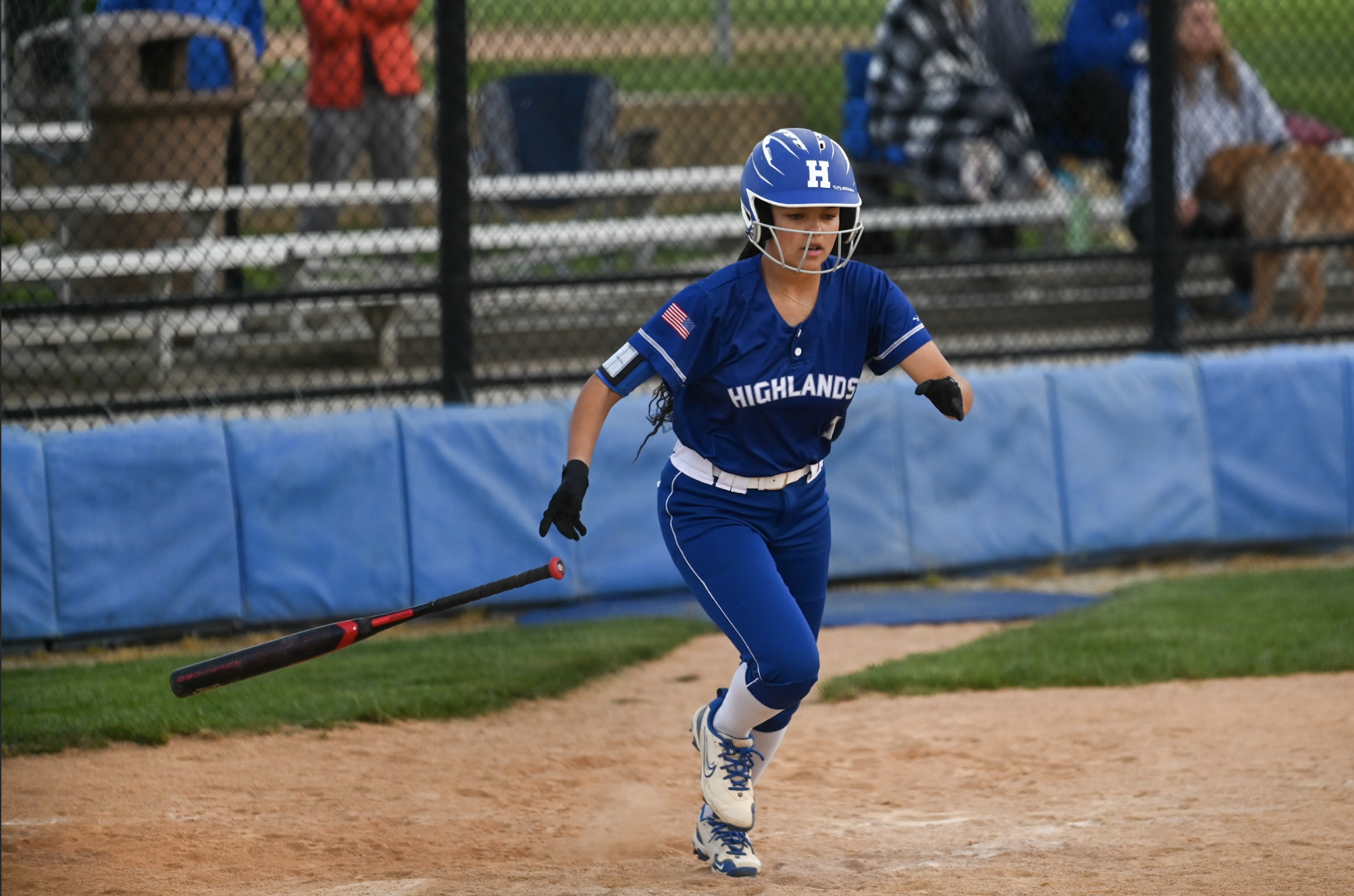 Amiyah Uehlein (10) drops her bat and runs to first base. "I felt like we did pretty good and that we needed a win like that," Uehlein (10) said.