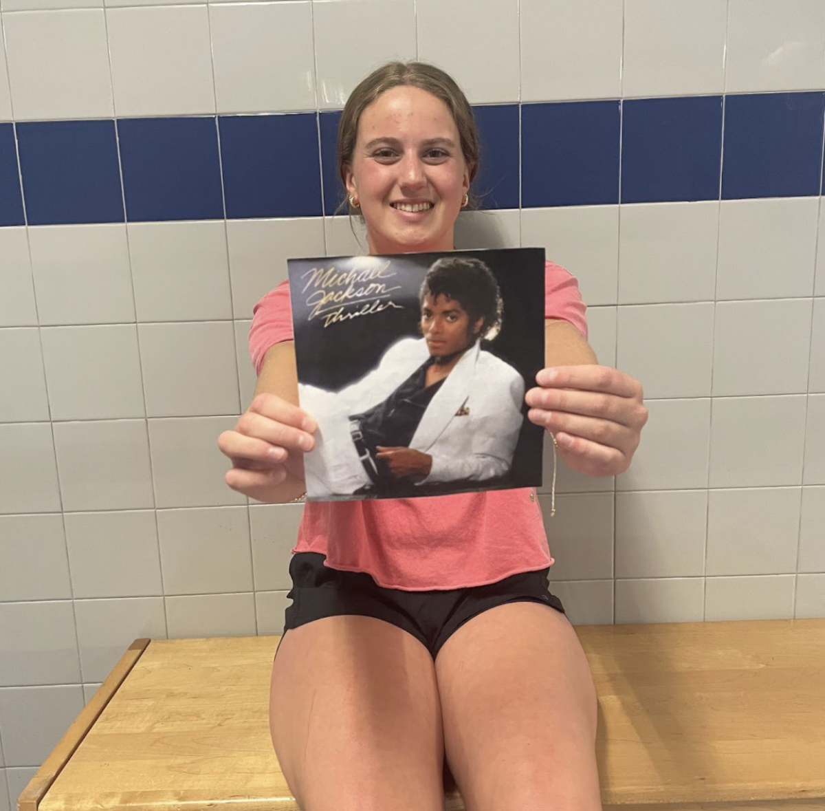 Jillian Alverson holds up “Thriller” Album.