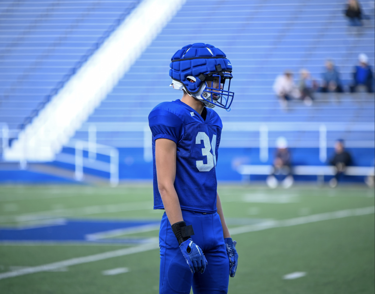 Charlie Feldbruegge (11) walks onto the field. "I feel like I did pretty good during the scrimmage, especially on offense" Feldbruegge (11) said.