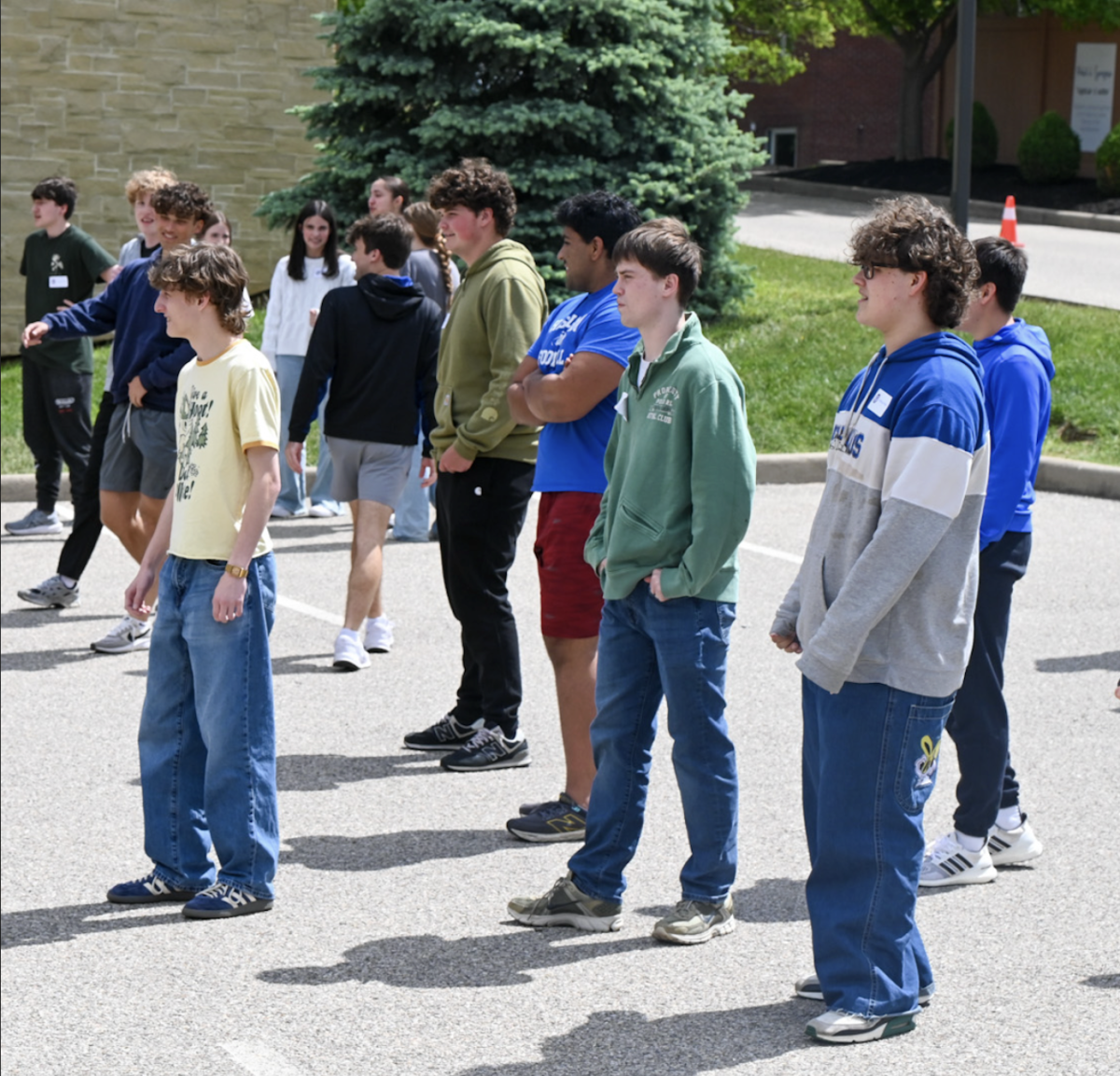 Seniors gather to play the annual kickball game against the current 5th graders at Woodfill elementary.