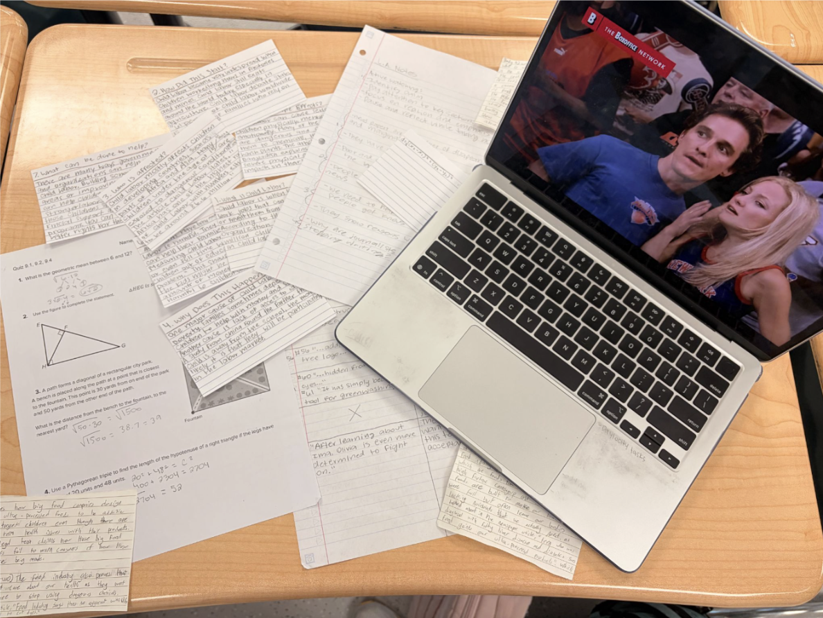 A stack of stressful work and a movie to help destress.